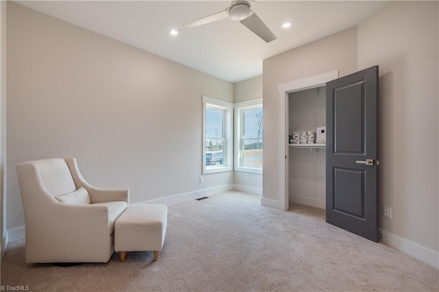 sitting room with visible vents, baseboards, recessed lighting, ceiling fan, and carpet flooring