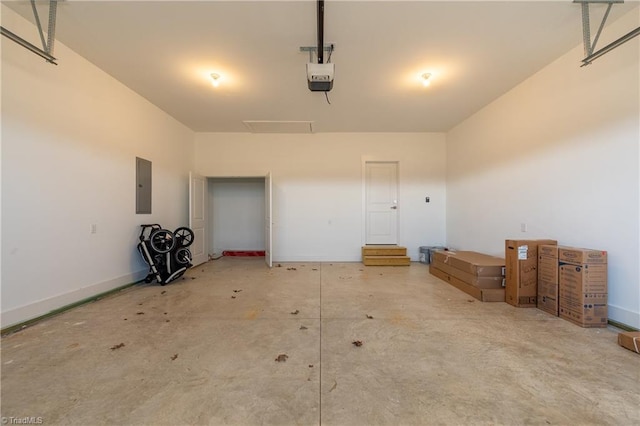 garage featuring electric panel, baseboards, and a garage door opener