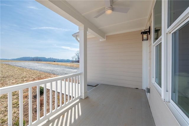 balcony with a ceiling fan