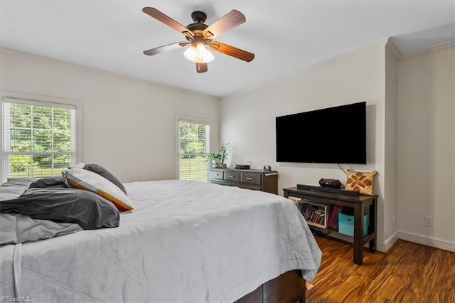 2515 E Woodlyn Way, Greensboro, NC 27407 - bedroom with crown molding, wood finished floors, baseboards, and ceiling fan