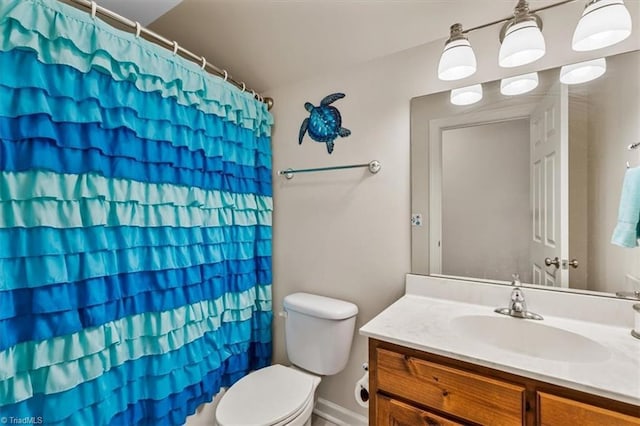2515 E Woodlyn Way, Greensboro, NC 27407 - full bathroom featuring toilet, vanity, and curtained shower