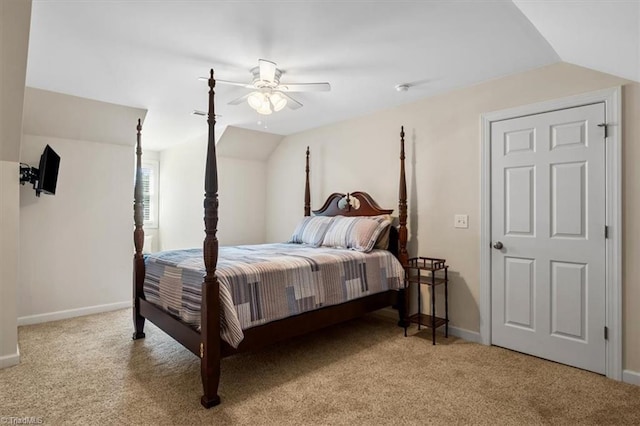 2515 E Woodlyn Way, Greensboro, NC 27407 - bedroom with light carpet, vaulted ceiling, baseboards, and ceiling fan
