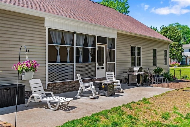 2515 E Woodlyn Way, Greensboro, NC 27407 - view of patio / terrace featuring area for grilling and a sunroom