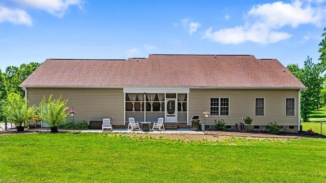 2515 E Woodlyn Way, Greensboro, NC 27407 - back of house featuring a lawn, a patio, a sunroom, crawl space, and entry steps