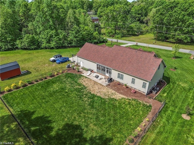 2515 E Woodlyn Way, Greensboro, NC 27407 - view from above of property featuring a heavily wooded area