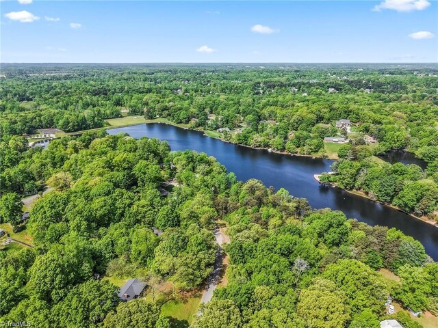 2515 E Woodlyn Way, Greensboro, NC 27407 - aerial view of a heavily wooded area and a nearby body of water