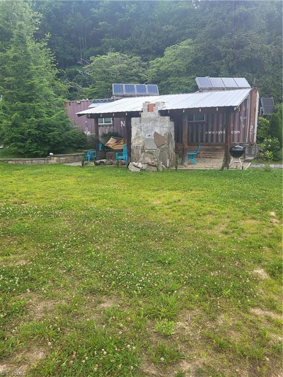 3273 N NC Highway 16, Millers Creek, NC 28651 - view of grassy yard featuring a view of trees