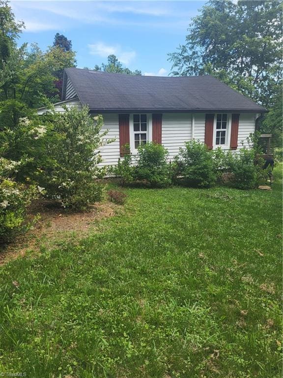 3273 N NC Highway 16, Millers Creek, NC 28651 - view of front of property with a front lawn