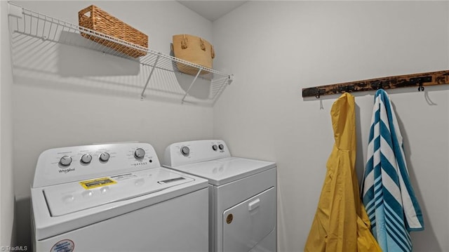 144 Rose Wind Way, Mayodan, NC 27027 - laundry room with washing machine and clothes dryer and laundry area