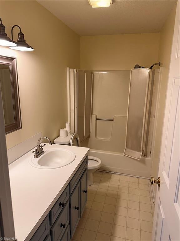 full bathroom with tile patterned flooring, vanity, toilet, and tub / shower combination