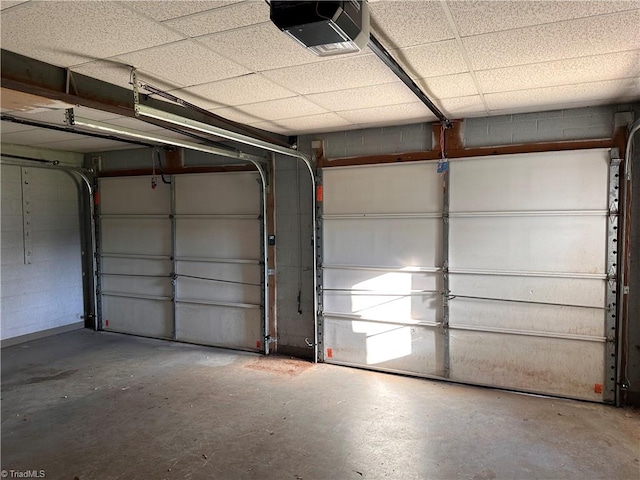 garage featuring a garage door opener