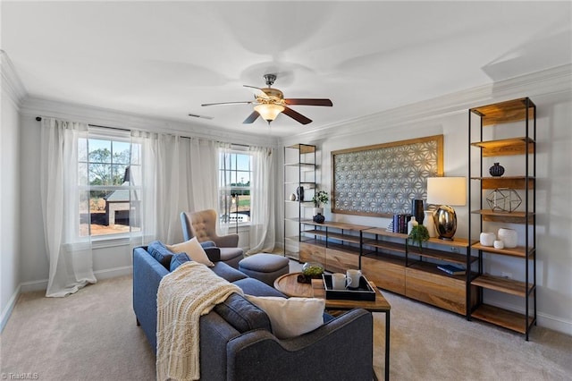 living room featuring ceiling fan, light colored carpet, and ornamental molding