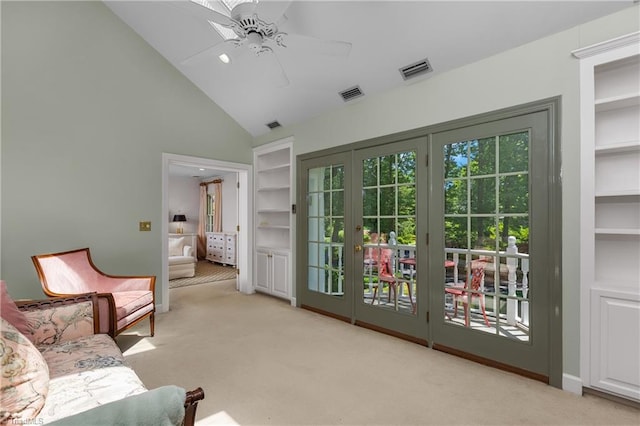 3500 Quarterstaff Pl, Winston-Salem, NC 27104 - living area with carpet, a ceiling fan, built in features, and high vaulted ceiling
