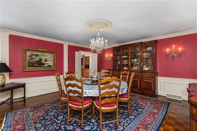 3500 Quarterstaff Pl, Winston-Salem, NC 27104 - dining space with a chandelier, wainscoting, crown molding, and a decorative wall