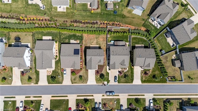 aerial overview of property's location featuring nearby suburban area