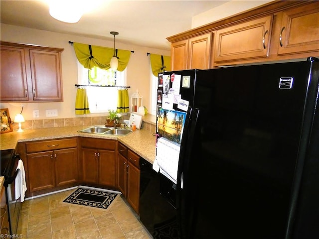 149 Pinewood Ln Unit 104, Bermuda Run, NC 27006 - kitchen featuring freestanding refrigerator, stove, a sink, brown cabinets, and light countertops