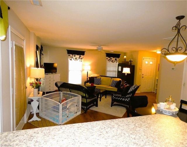 149 Pinewood Ln Unit 104, Bermuda Run, NC 27006 - living area with wood finished floors and a ceiling fan