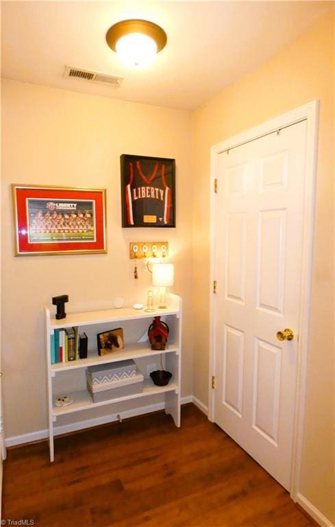 149 Pinewood Ln Unit 104, Bermuda Run, NC 27006 - hall featuring dark wood-style flooring and baseboards