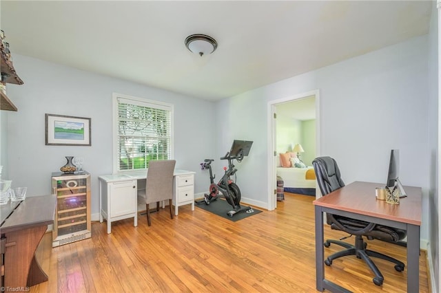 1134 W End Blvd, Winston-Salem, NC 27101 - home office with beverage cooler and light wood-type flooring