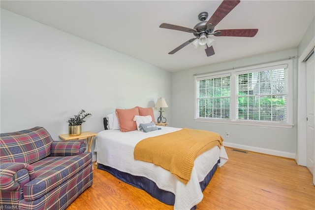 1134 W End Blvd, Winston-Salem, NC 27101 - bedroom with wood finished floors, a ceiling fan, and a closet