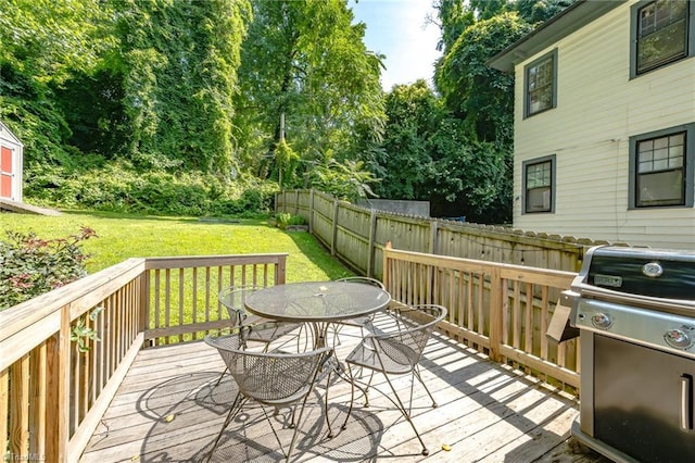 1134 W End Blvd, Winston-Salem, NC 27101 - wooden terrace featuring outdoor dining area, grilling area, and view of scattered trees