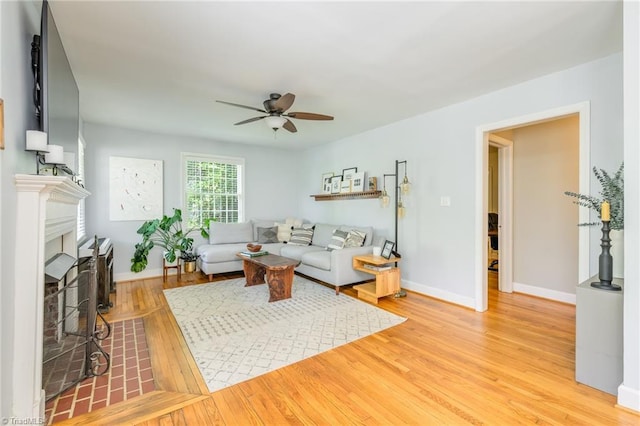 1134 W End Blvd, Winston-Salem, NC 27101 - living area with a ceiling fan, wood finished floors, and a fireplace with flush hearth