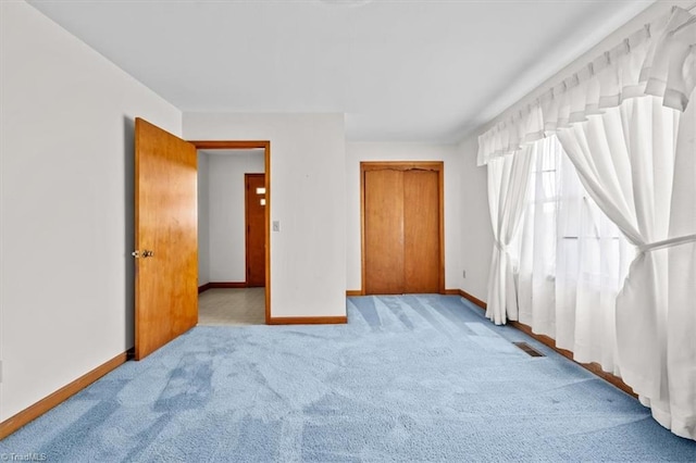6277 Bennett Rd, Seagrove, NC 27341 - unfurnished bedroom featuring carpet floors and baseboards