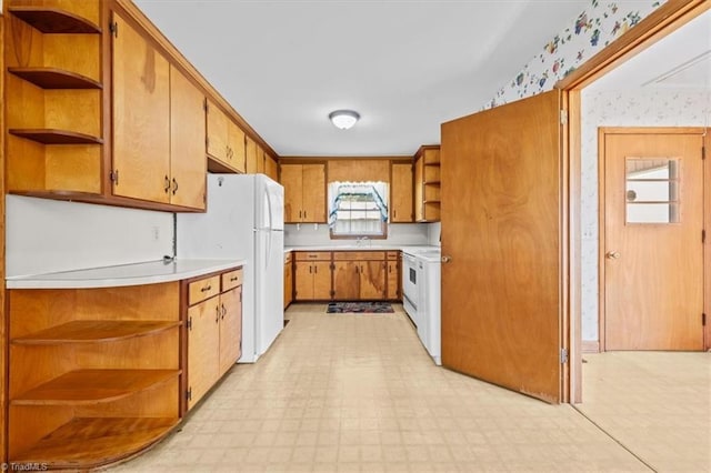 6277 Bennett Rd, Seagrove, NC 27341 - kitchen with open shelves, freestanding refrigerator, a sink, light countertops, and light flooring