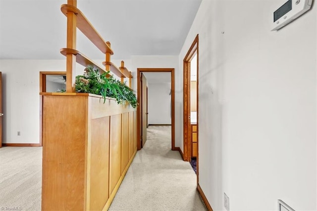 6277 Bennett Rd, Seagrove, NC 27341 - hallway featuring light colored carpet and baseboards