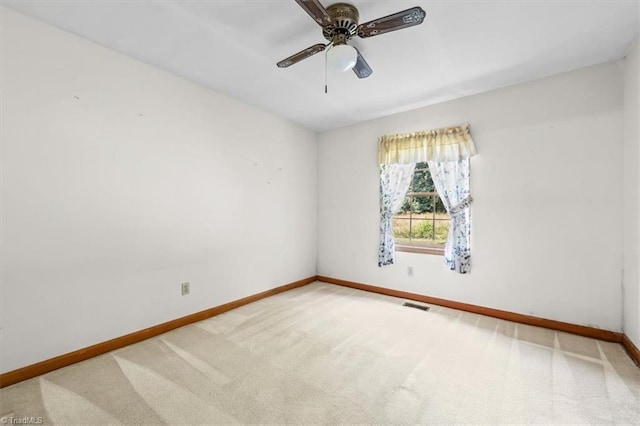 6277 Bennett Rd, Seagrove, NC 27341 - carpeted empty room featuring baseboards and a ceiling fan