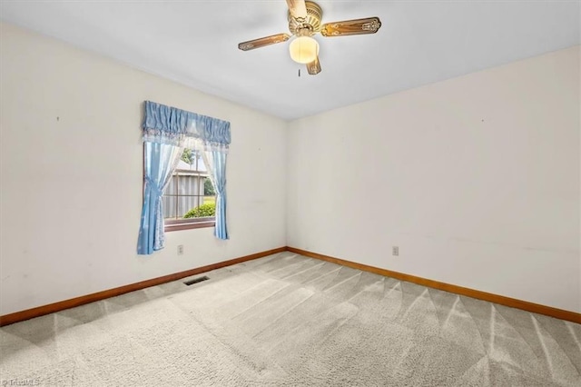 6277 Bennett Rd, Seagrove, NC 27341 - spare room featuring baseboards, light colored carpet, and ceiling fan