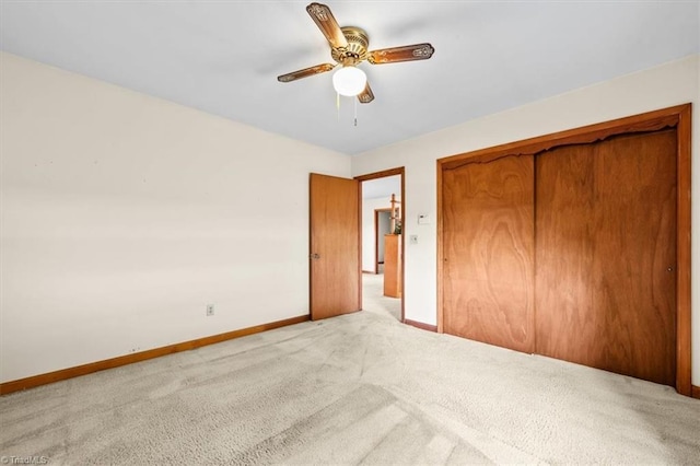 6277 Bennett Rd, Seagrove, NC 27341 - unfurnished bedroom with carpet, baseboards, a closet, and ceiling fan