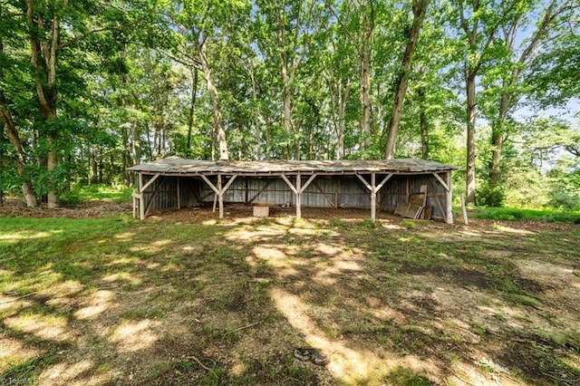 6277 Bennett Rd, Seagrove, NC 27341 - rear view of house with an outbuilding