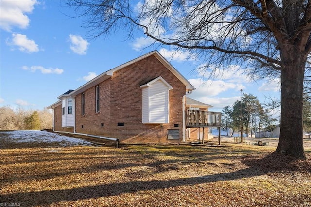 view of side of home featuring a deck