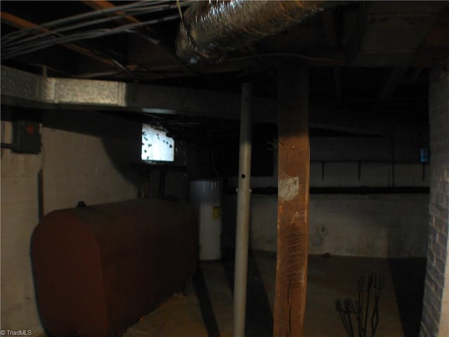 unfinished below grade area with water heater and heating fuel