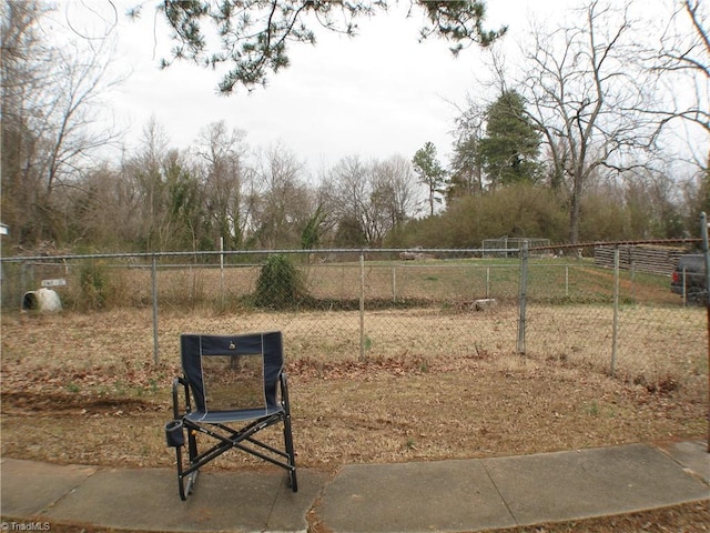 view of home's community with fence