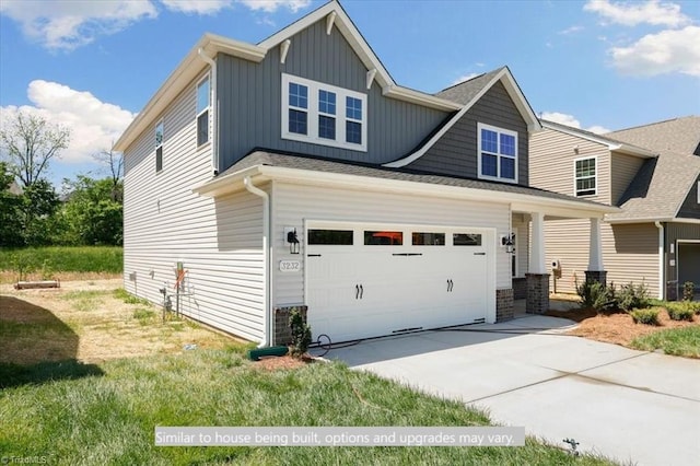 4090 Stallion St Lot 74, High Point, NC 27262 - view of front of home featuring board and batten siding, driveway, and a garage