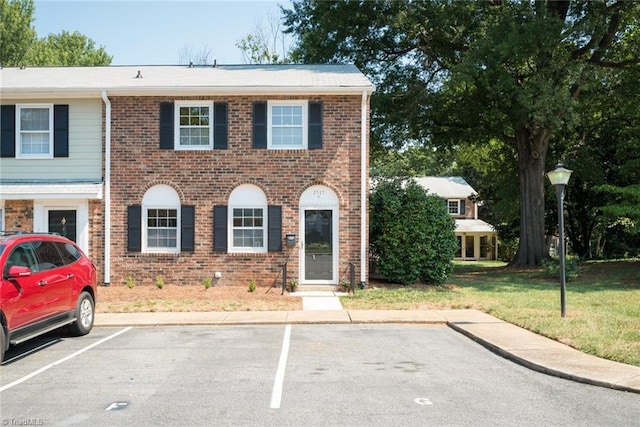 view of front of property with a front lawn