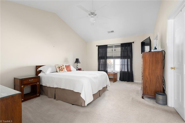 carpeted bedroom featuring ceiling fan and vaulted ceiling