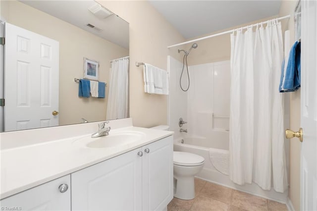 full bathroom featuring toilet, shower / tub combo, vanity, and tile patterned floors