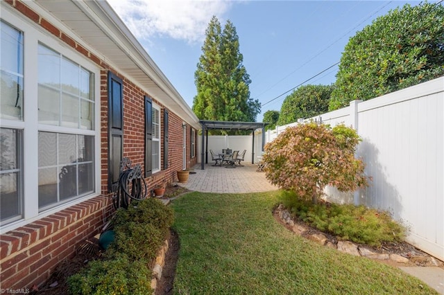 view of yard with a patio area