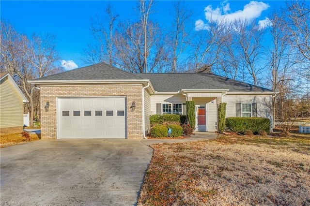 single story home featuring a front lawn and a garage