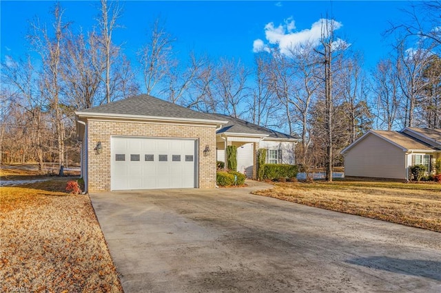 ranch-style home featuring a garage