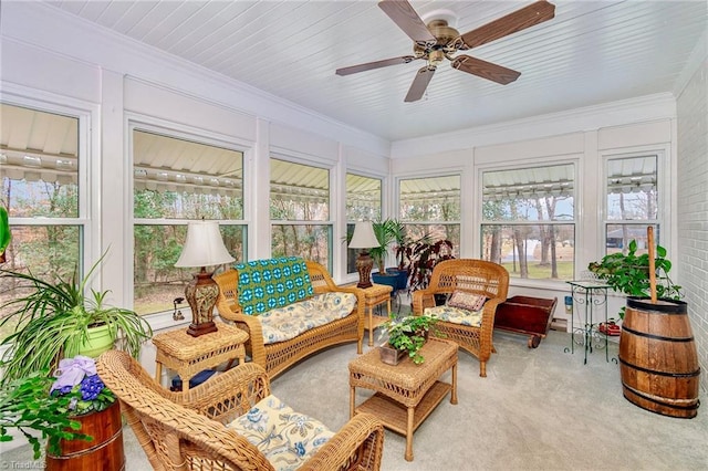 sunroom / solarium with ceiling fan