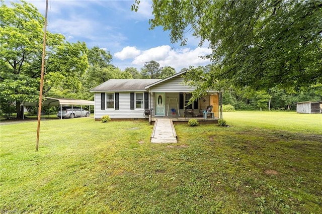 126 J Nettie Dr, Lexington, NC 27292 - view of front of house featuring a porch, a detached carport, and a front lawn