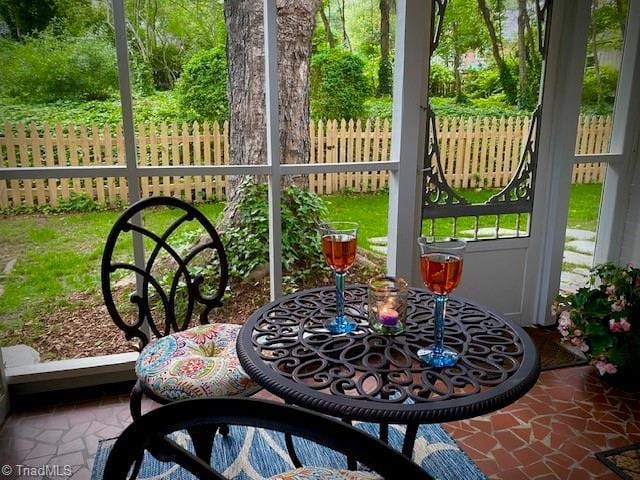 305 W Avondale Dr, Greensboro, NC 27403 - sunroom featuring healthy amount of natural light