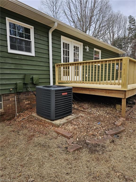 exterior space featuring central AC unit