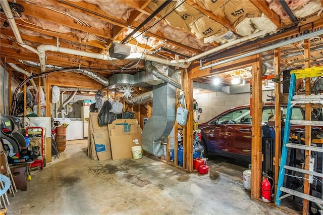 unfinished below grade area featuring washer and clothes dryer