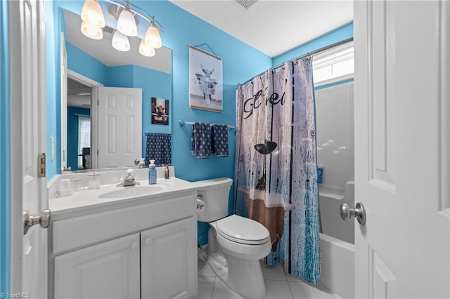 bathroom with a notable chandelier, shower / bath combination with curtain, toilet, vanity, and tile patterned flooring