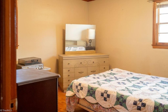 bedroom with light wood-style floors